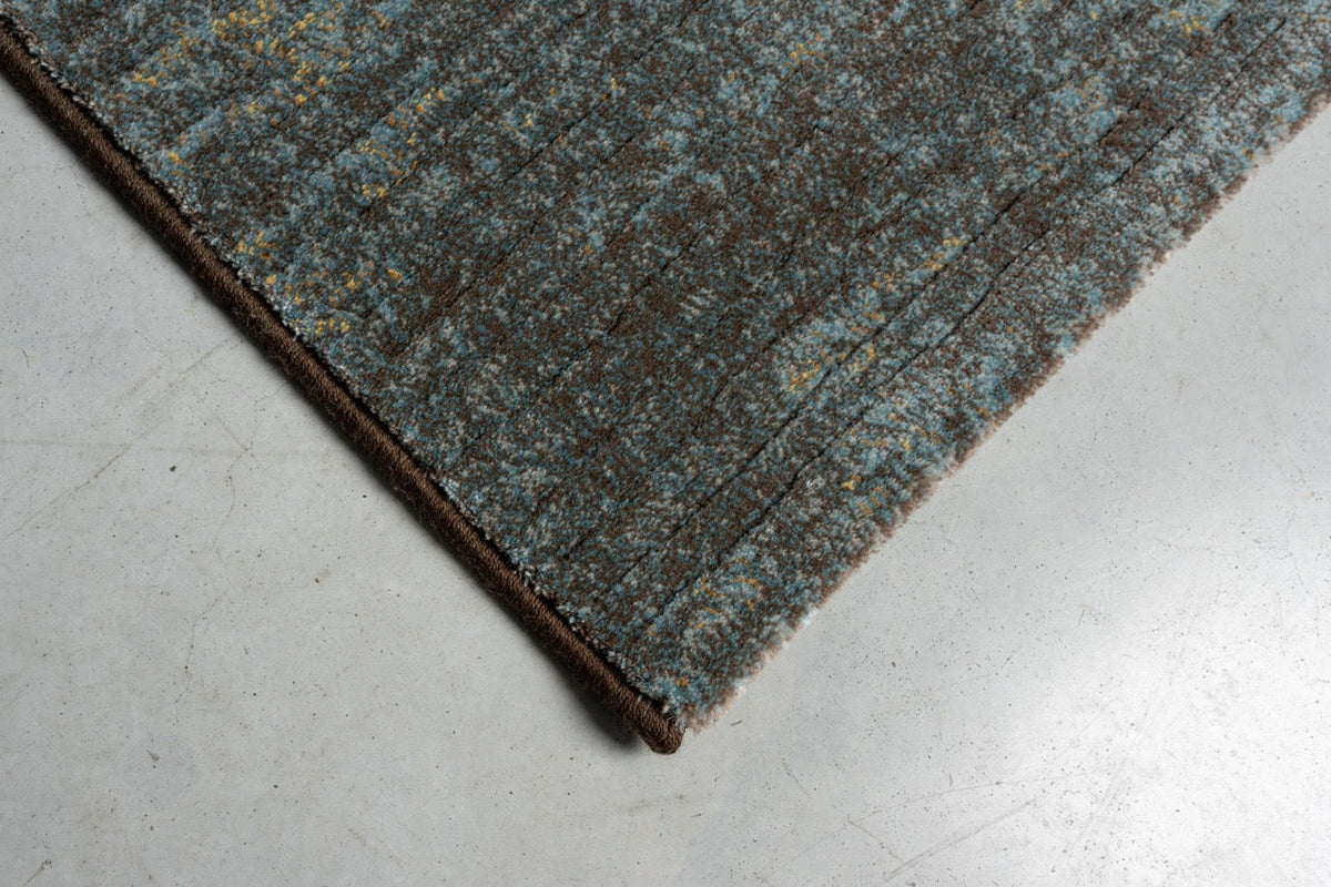 Tapis bleu canard et brun Tapison Home Torino, détail