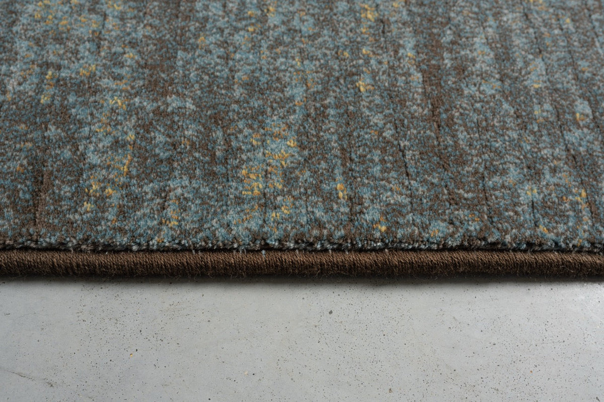 Tapis bleu canard et brun Tapison Home Torino, détail