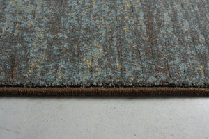 Tapis bleu canard et brun Tapison Home Torino, détail