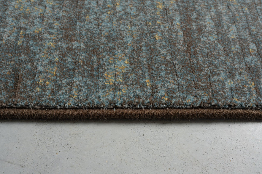 Tapis bleu canard et brun Tapison Home Torino, détail