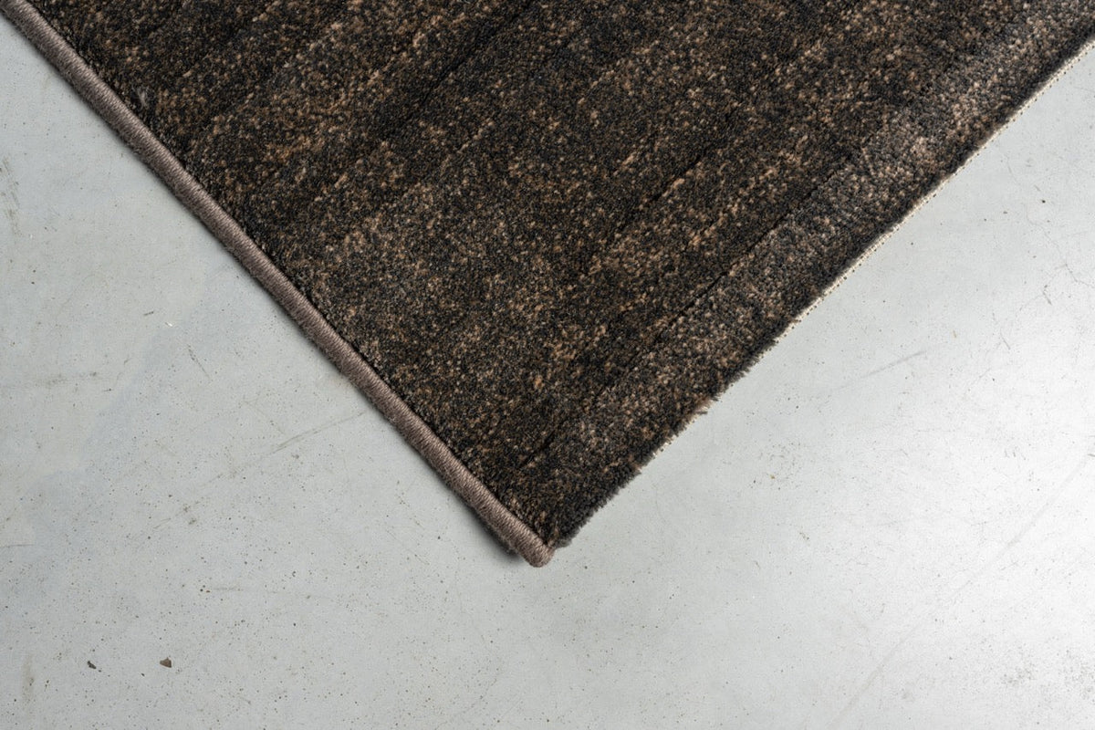 Tapis ras brun espresso Tapison Home Torino, détail
