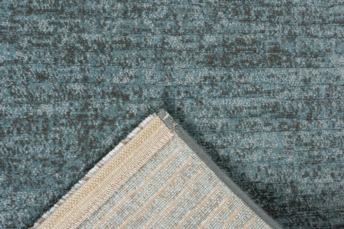 Tapis bleu pétrole Tapison Home Torino, détail