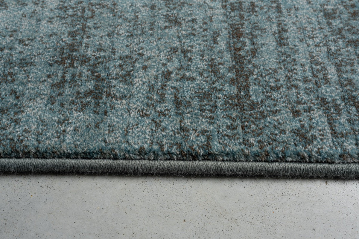 Tapis bleu pétrole Tapison Home Torino, détail