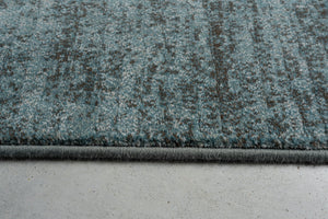 Tapis bleu pétrole Tapison Home Torino, détail