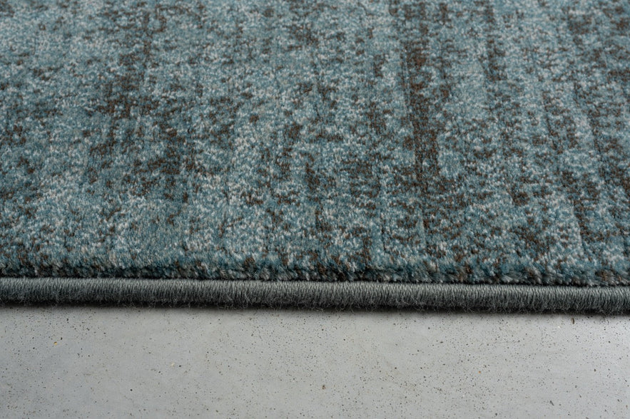Tapis bleu pétrole Tapison Home Torino, détail