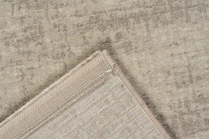 Tapis ras beige sable Tapison Home Torino, détail