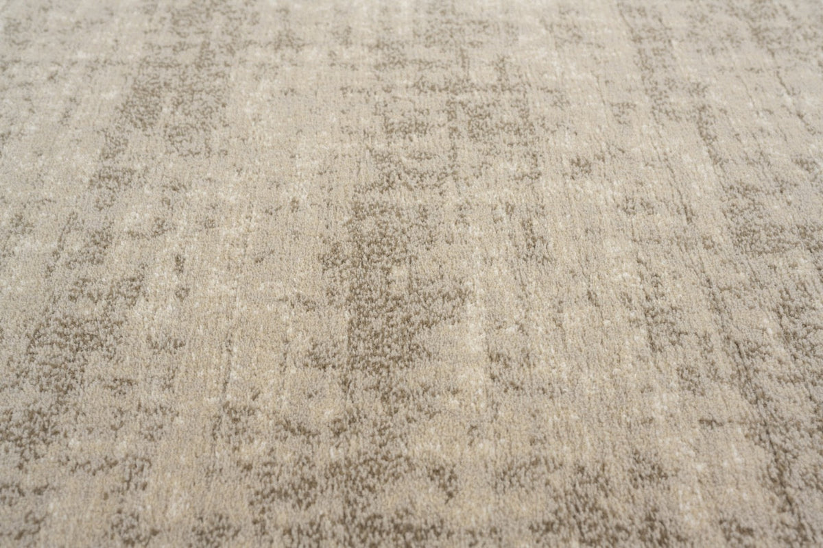 Tapis ras beige sable Tapison Home Torino, détail