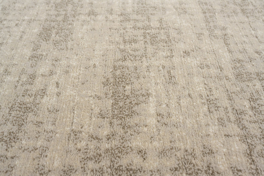 Tapis ras beige sable Tapison Home Torino, détail