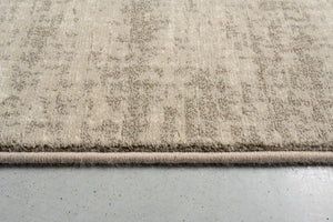 Tapis ras beige sable Tapison Home Torino, détail