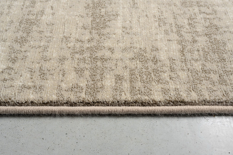 Tapis ras beige sable Tapison Home Torino, détail