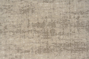 Tapis ras beige sable Tapison Home Torino, détail