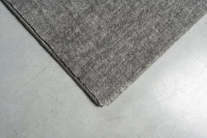 Tapis ras gris flanelle Tapison Home Torino, détail