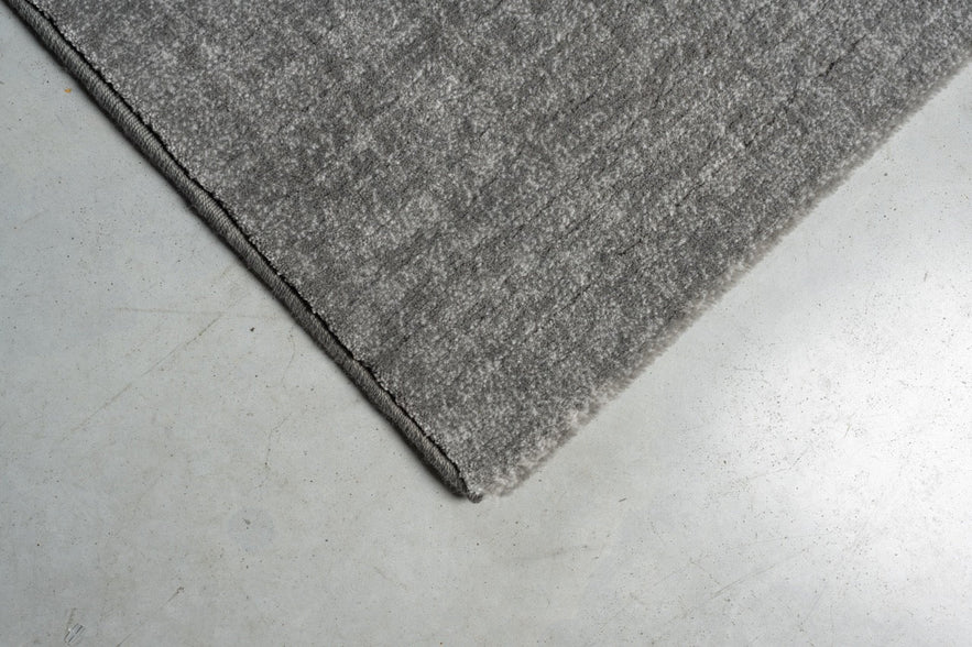 Tapis ras gris flanelle Tapison Home Torino, détail