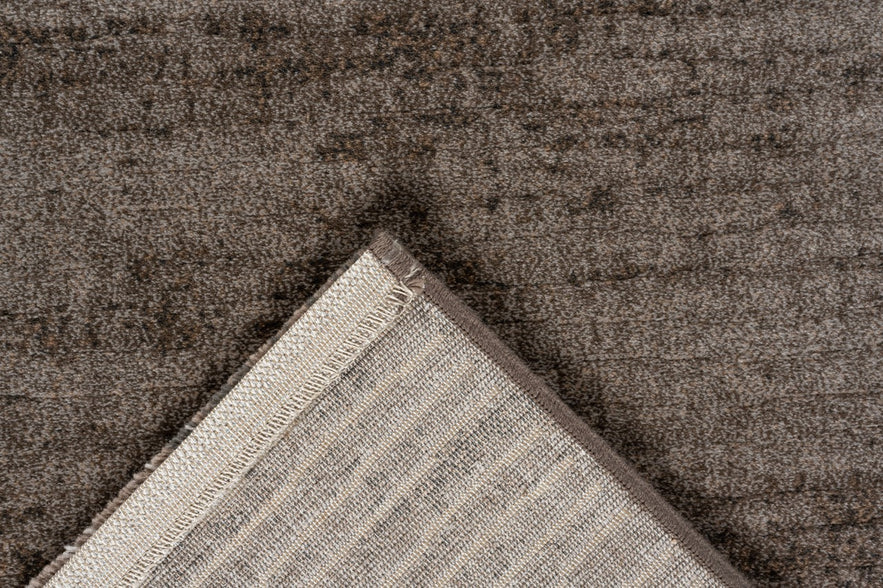 Tapis ras taupe Tapison Home Torino, détail