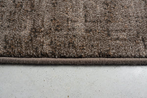 Tapis ras taupe Tapison Home Torino, détail