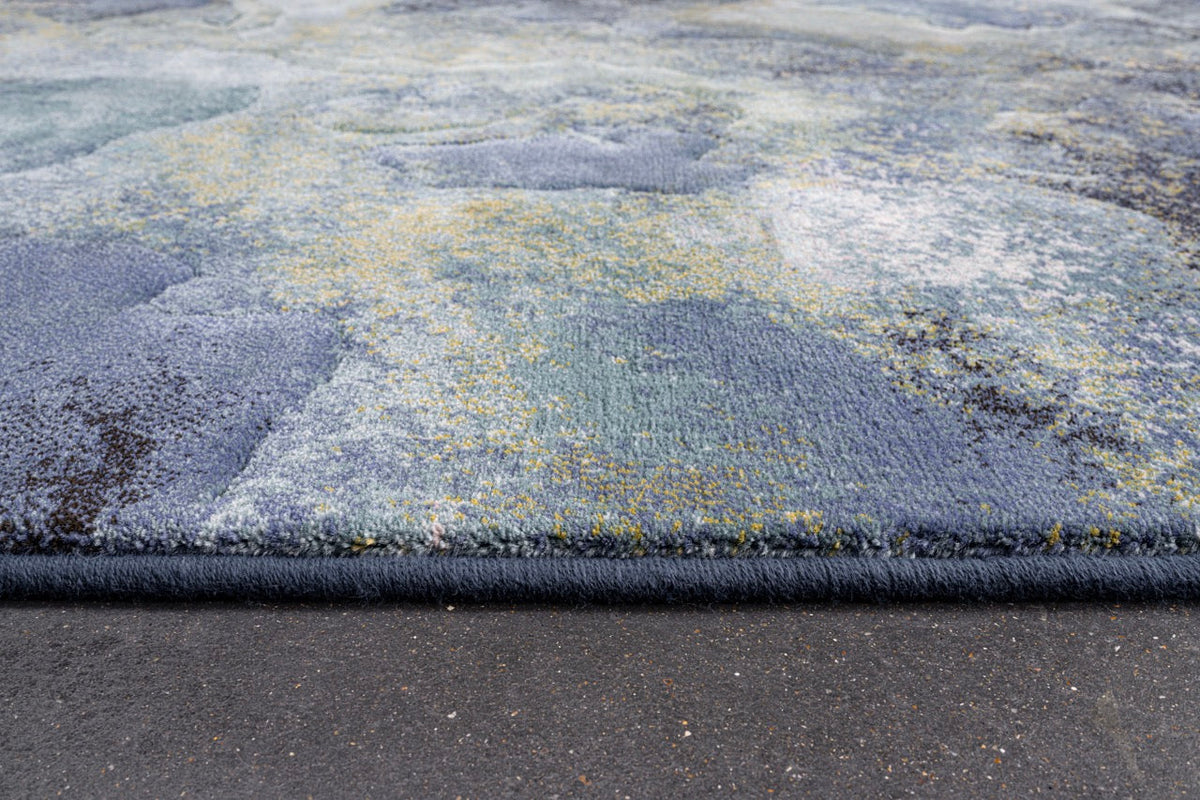 Vue de profil du velours ras et de la bordure du tapis Tapison Home Torino 063.0934.5241