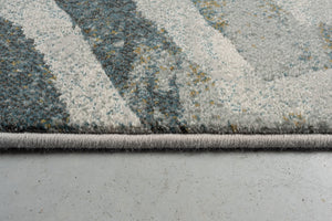 Vue de profil du velours ras et de la bordure du tapis Tapison Home Torino 063.0990.4299