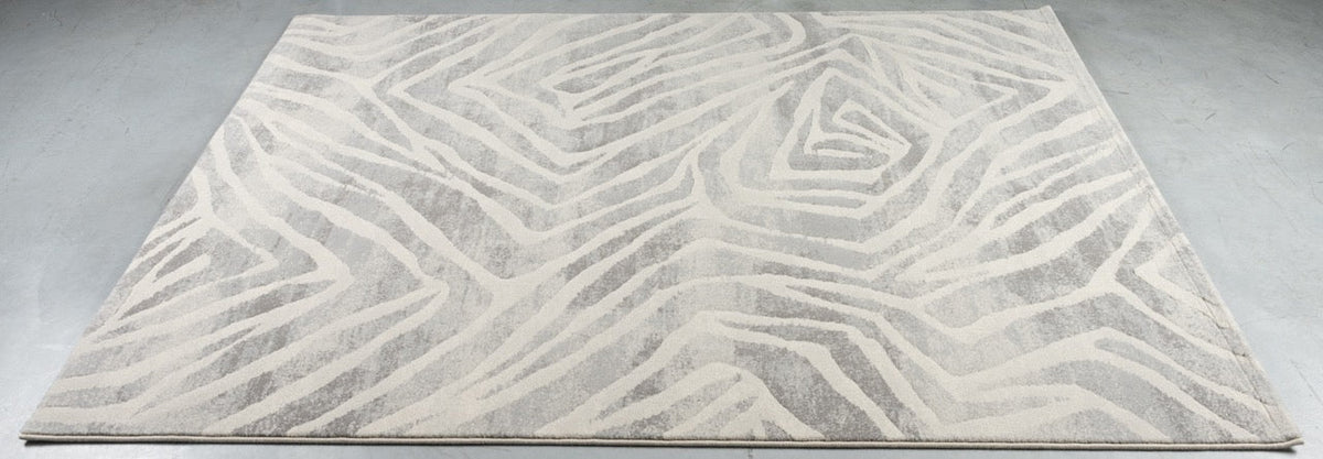 Tapis Tapison Home Torino 063.0990.6797 posé au sol, vu en perspective