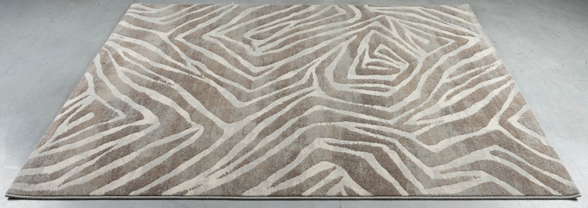 Tapis Tapison Home Torino 063.0990.9243 posé au sol, vu en perspective