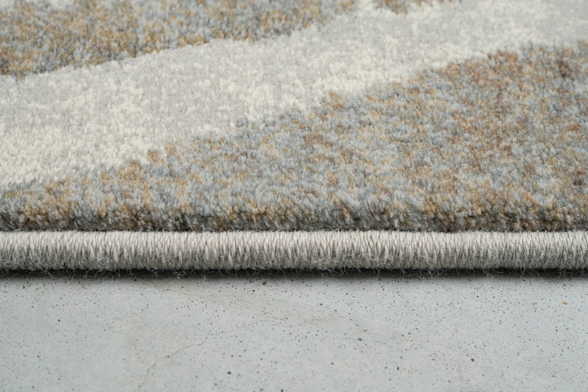 Vue de profil du velours ras et de la bordure du tapis Tapison Home Torino 063.0990.9243
