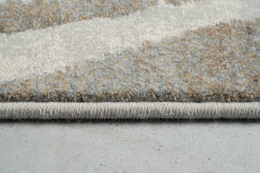 Vue de profil du velours ras et de la bordure du tapis Tapison Home Torino 063.0990.9243