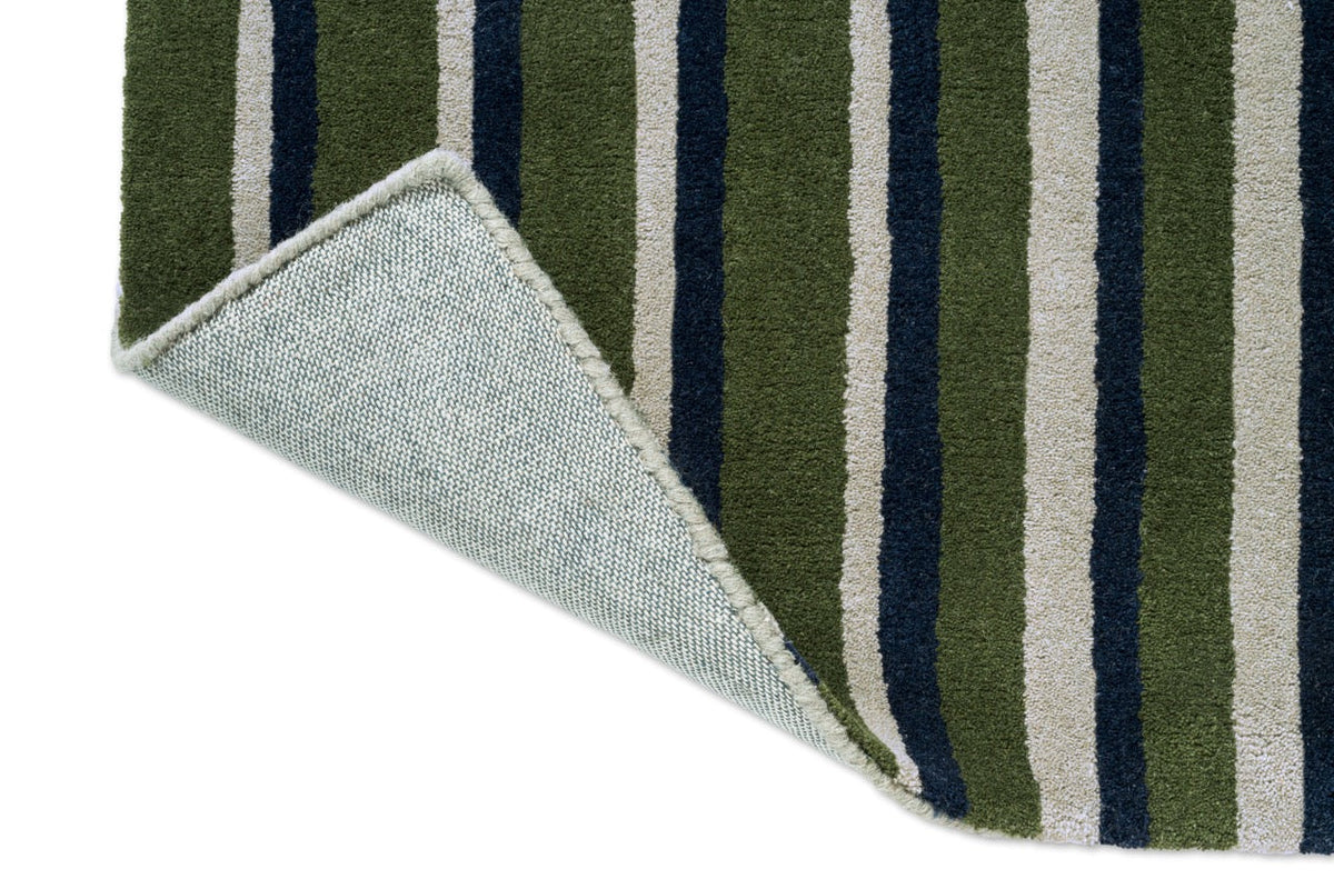 Tapis Brink & Campman Decor Pilar Moss, détail de l'angle replié et du dos