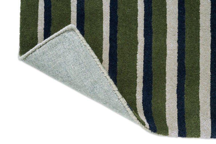 Tapis Brink & Campman Decor Pilar Moss, détail de l'angle replié et du dos