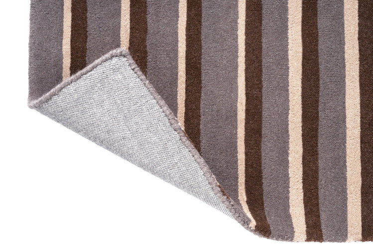 Tapis Brink & Campman Decor Pilar Taupe, détail de l'angle replié et du dos