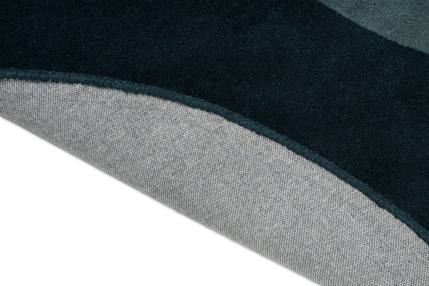 Tapis Brink & Campman Element Lane Blue, détail du bord replié et du dos