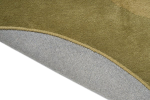 Tapis Brink & Campman Element Lane Green, détail du bord replié et du dos