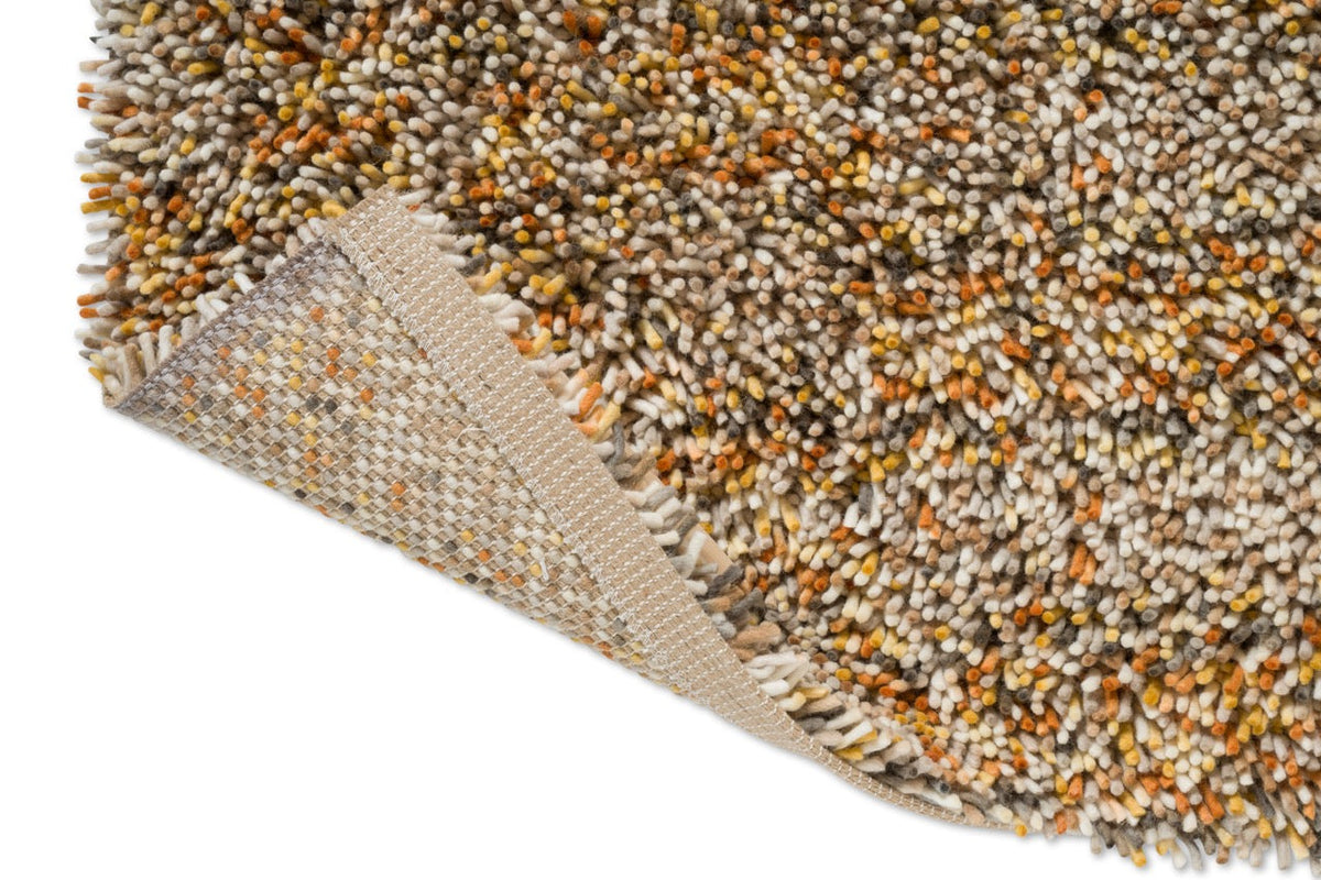 Tapis Brink & Campman Loom Calendula, détail de l'angle replié et du dos