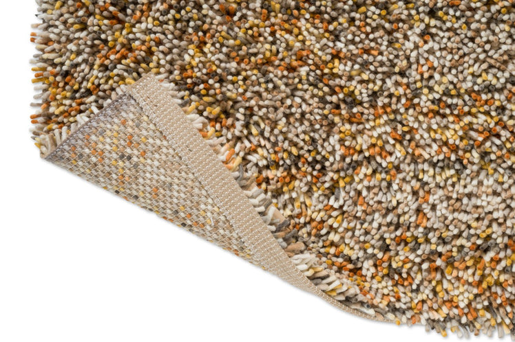 Tapis Brink & Campman Loom Calendula, détail de l'angle replié et du dos