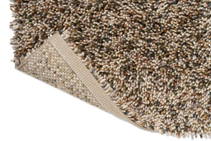 Tapis Brink & Campman Loom Natural Moss, détail de l'angle replié et du dos