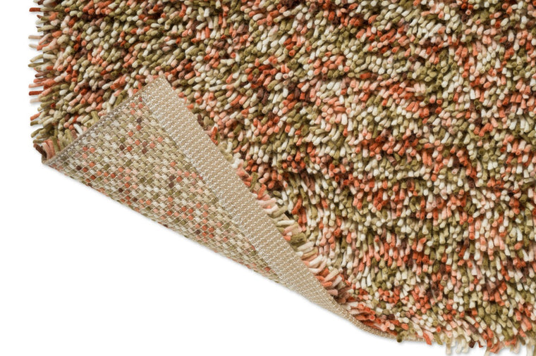 Tapis Brink & Campman Loom Pumpkin, détail de l'angle replié et du dos