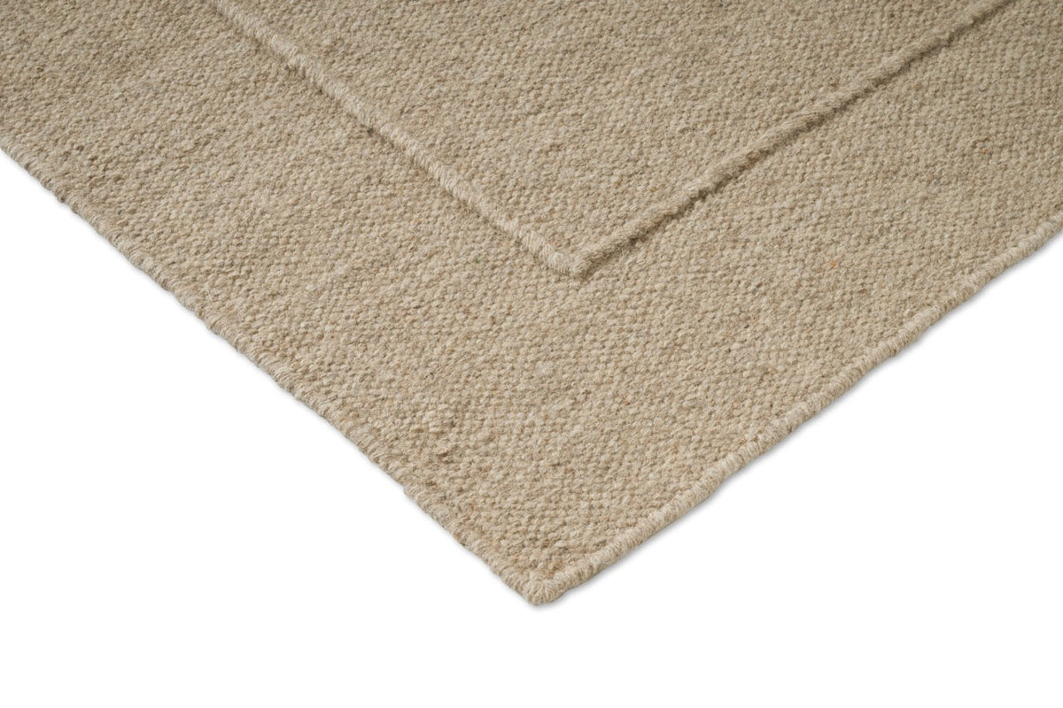 Tapis Brink & Campman Senso Planes Natural, détail de l'angle et du tissage