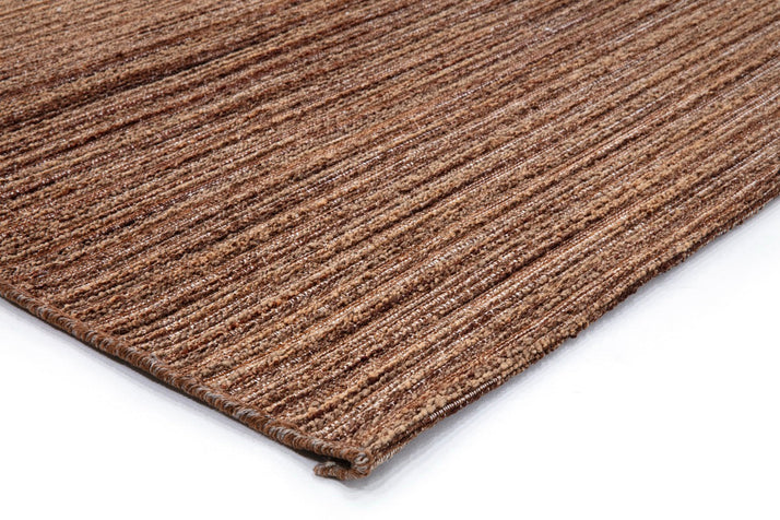 Tapis Acsento Origin Brown, détail de l'angle et du poil