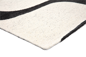 Tapis Acsento Swing Black-White, détail de l'angle et du poil