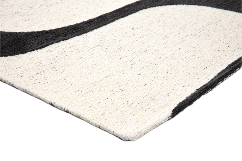 Tapis Acsento Swing Black-White, détail de l'angle et du poil