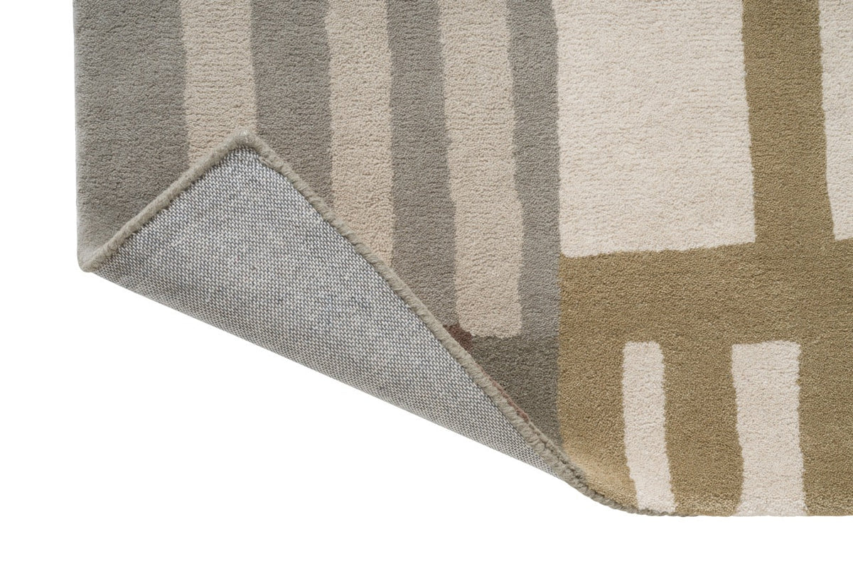 Tapis Harlequin Monolith Sandstone, détail de l'angle replié et du dos