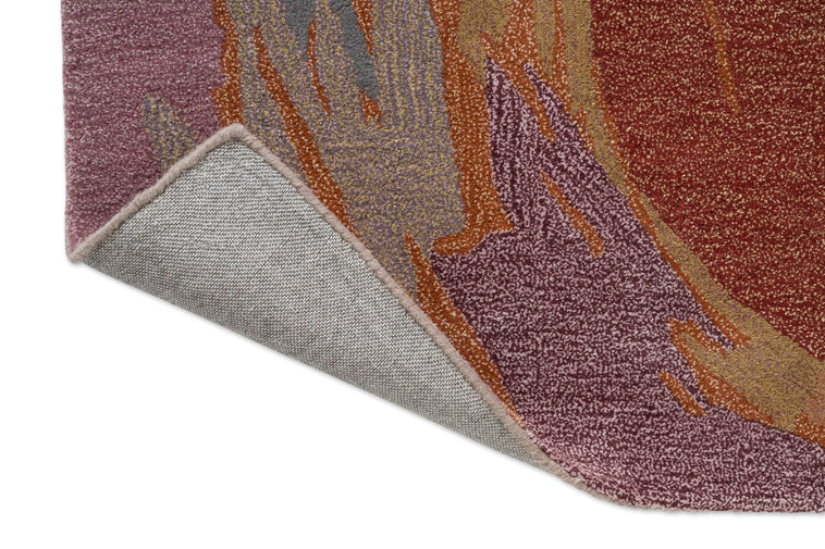 Tapis Harlequin Saltillo Rosewood, détail de l'angle replié et du dos