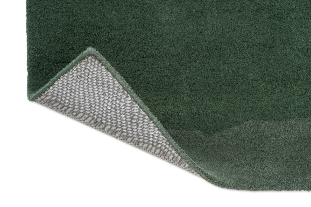 Tapis Harlequin Sedimentary Pine, détail de l'angle replié et du dos