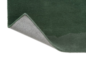 Tapis Harlequin Sedimentary Pine, détail de l'angle replié et du dos