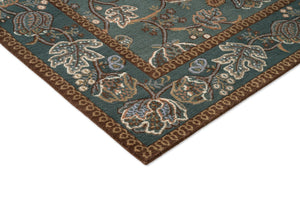 Tapis Morris & Co Theodosia Bottle Green, détail de l'angle et du poil