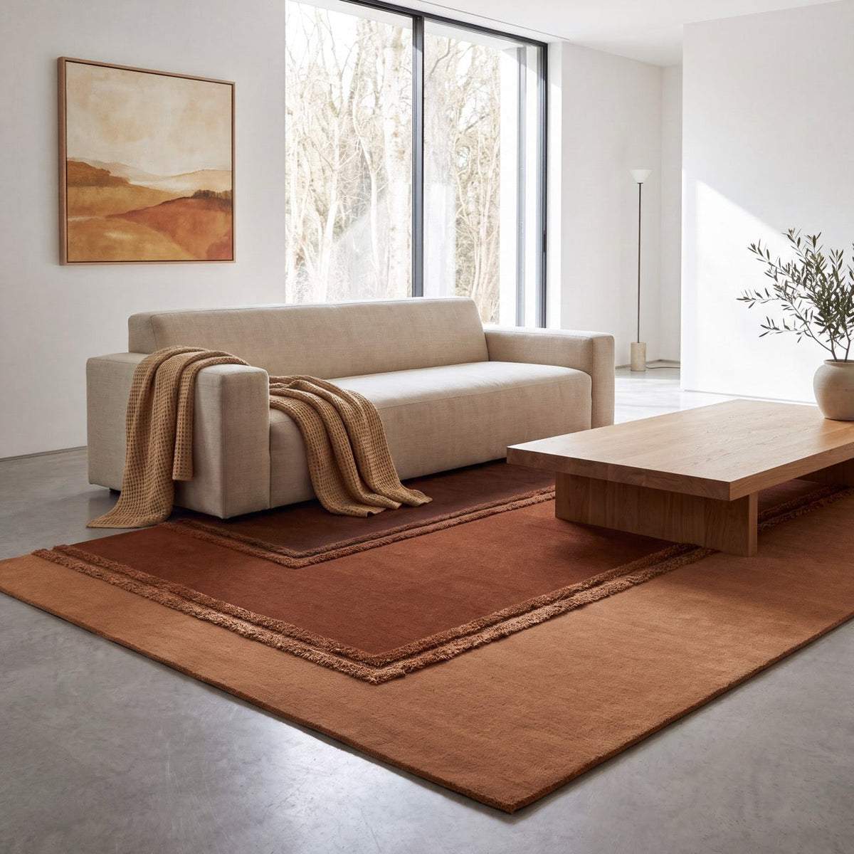 Tapis Acsento Delos Rust rouille, terracotta et brun chocolat à bordures en relief, dans un intérieur