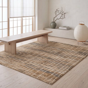 Tapis Acsento Siena 68 beige à carreaux doux sable, ocre et anthracite, dans un intérieur