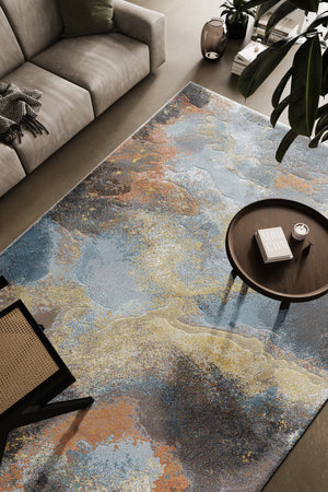 Tapis abstrait rouille et bleu Tapison Home Torino, dans un intérieur