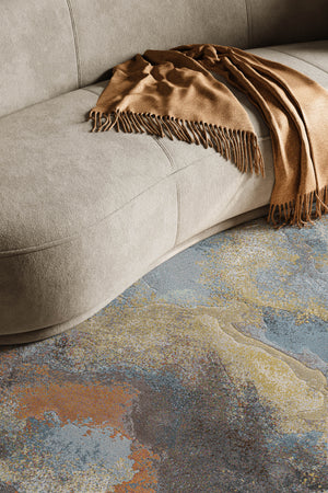 Tapis abstrait rouille et bleu Tapison Home Torino, dans un intérieur