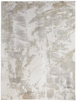 Abstract patterned rug with neutral colors on a white background