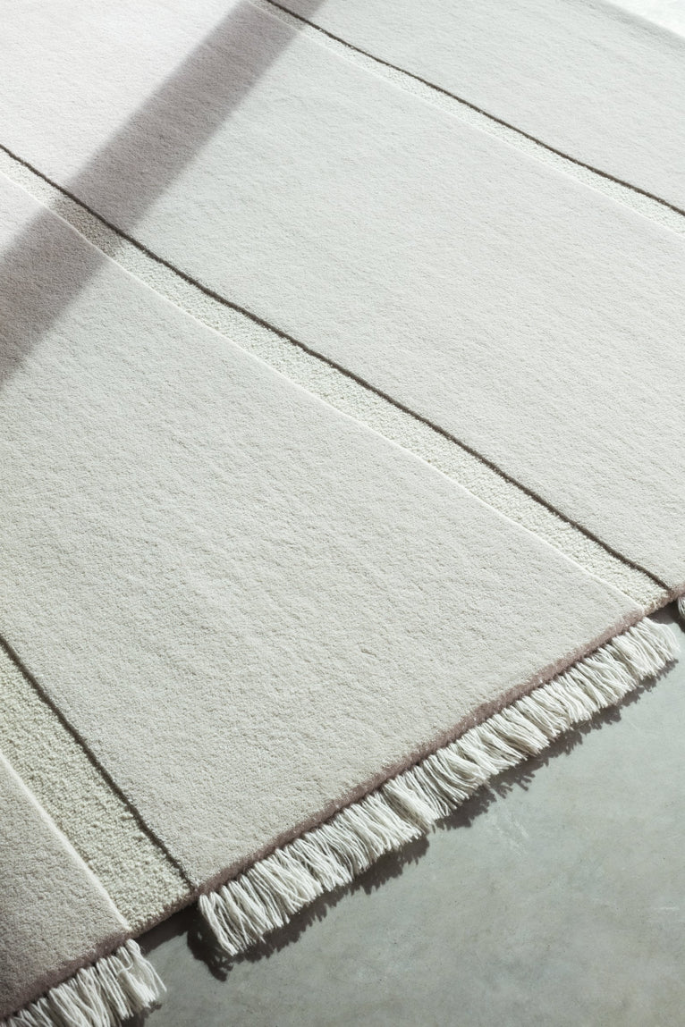 Massimo Atoll Cream tapis tufté en laine, détail du coin