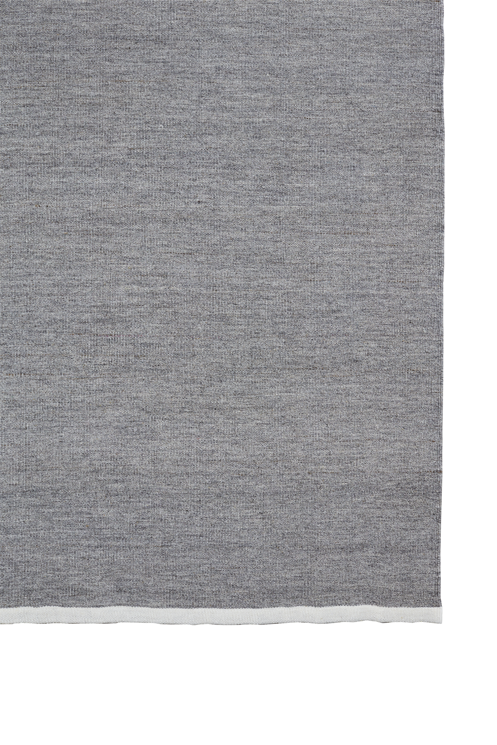 Massimo Escape Kelim Stone tapis plat gris, vue d'ensemble avec la bande contrastée en bout